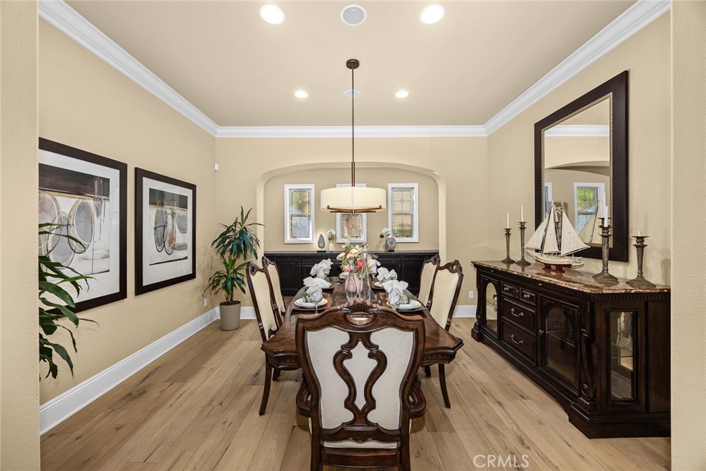 19668 Three Oaks Lane Walnut, CA 91789 - Photo 9 of 45 a view of a dining room with furniture window and wooden floor