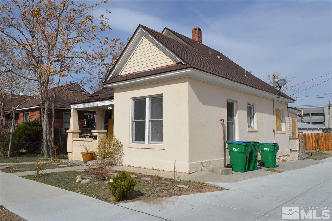 343 Stewart Street Reno, NV 89502 - Photo 1 of 4 a front view of a house with garage