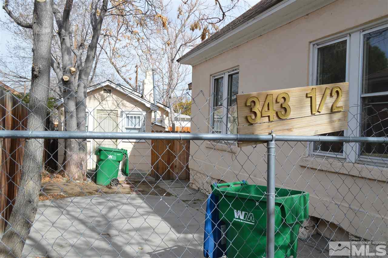 343 Stewart Street Reno, NV 89502 - Photo 3 of 4 a front view of a house with garden