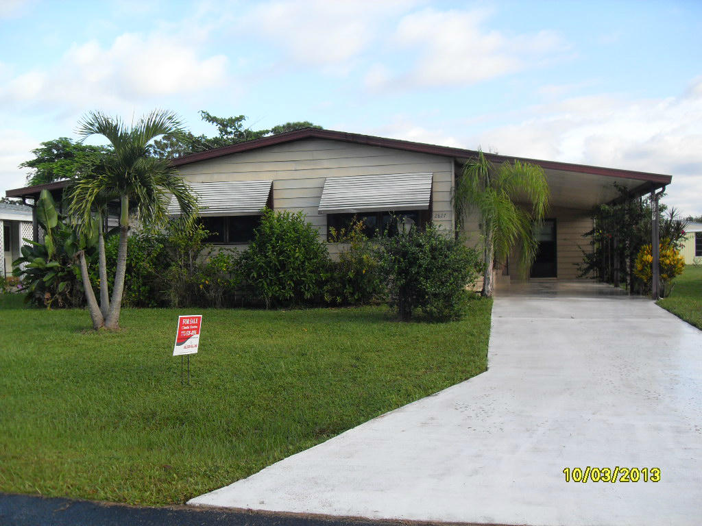 2827 Southwest Monarch Trail Stuart, FL 34997 - Photo 1 of 17 FRONT VIEW