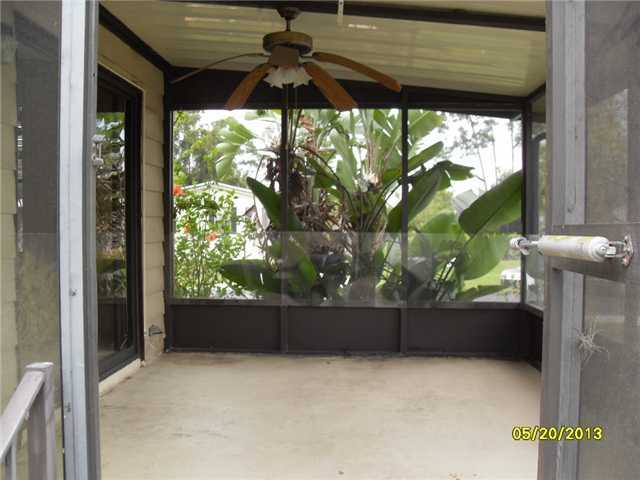 2827 Southwest Monarch Trail Stuart, FL 34997 - Photo 14 of 17 Screened covered patio