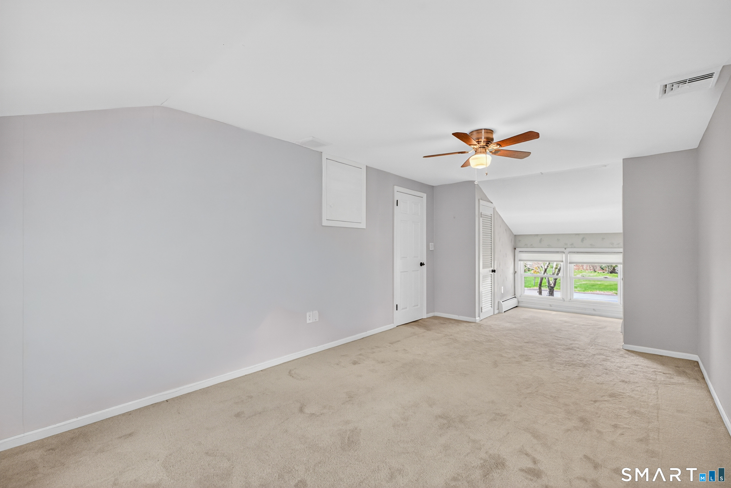 568 Wiese Road Cheshire, CT 06410 - Photo 28 of 40 a view of an empty room with a window
