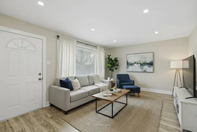 a living room with furniture and a couch