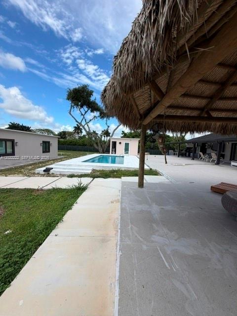 20465 Southwest 200th Street Miami, FL 33187 - Photo 7 of 36 a view of a backyard