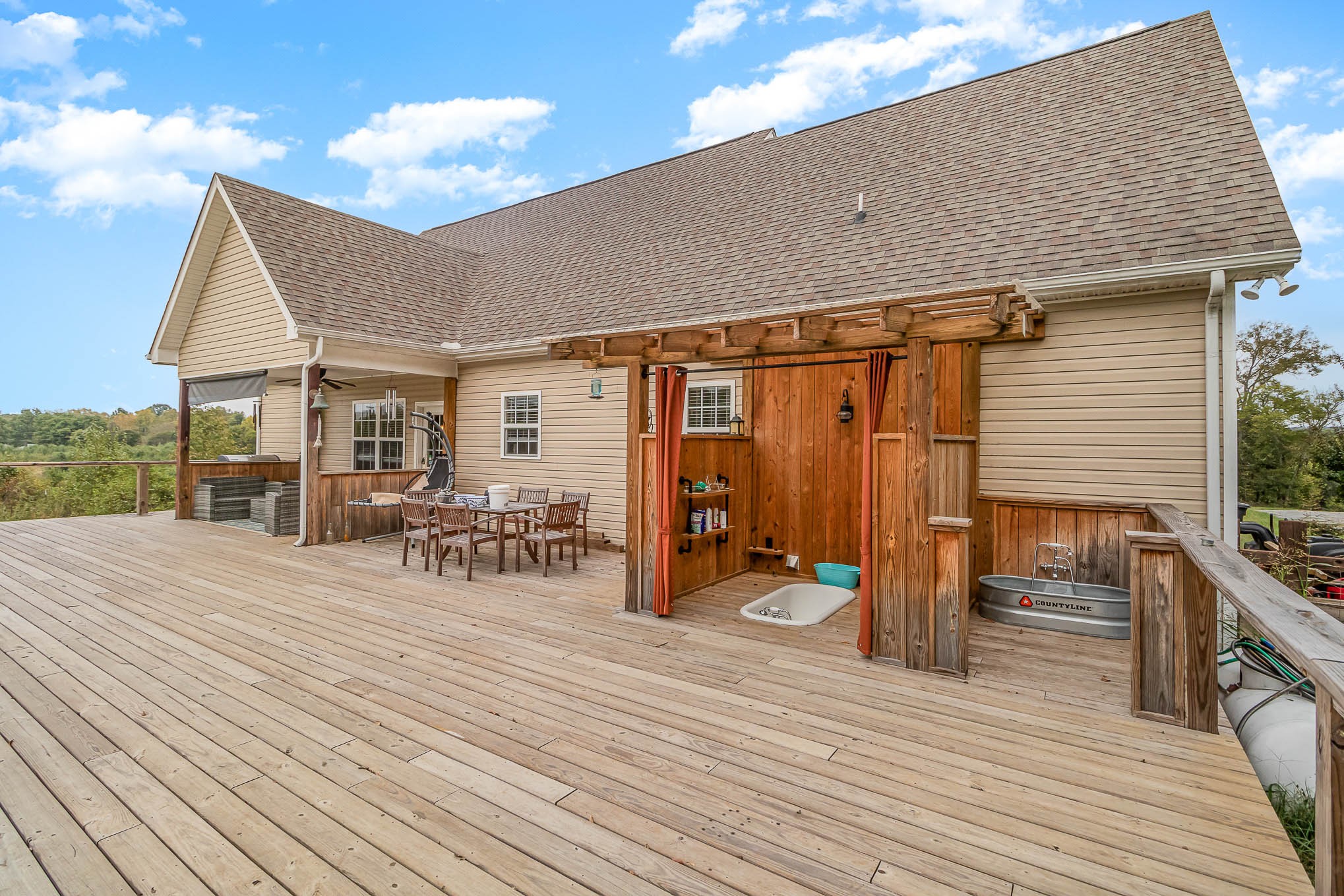 3997 Mitchell Road Lebanon, TN 37087 - Photo 21 of 27 a view of a dinning table and chairs in the roof deck