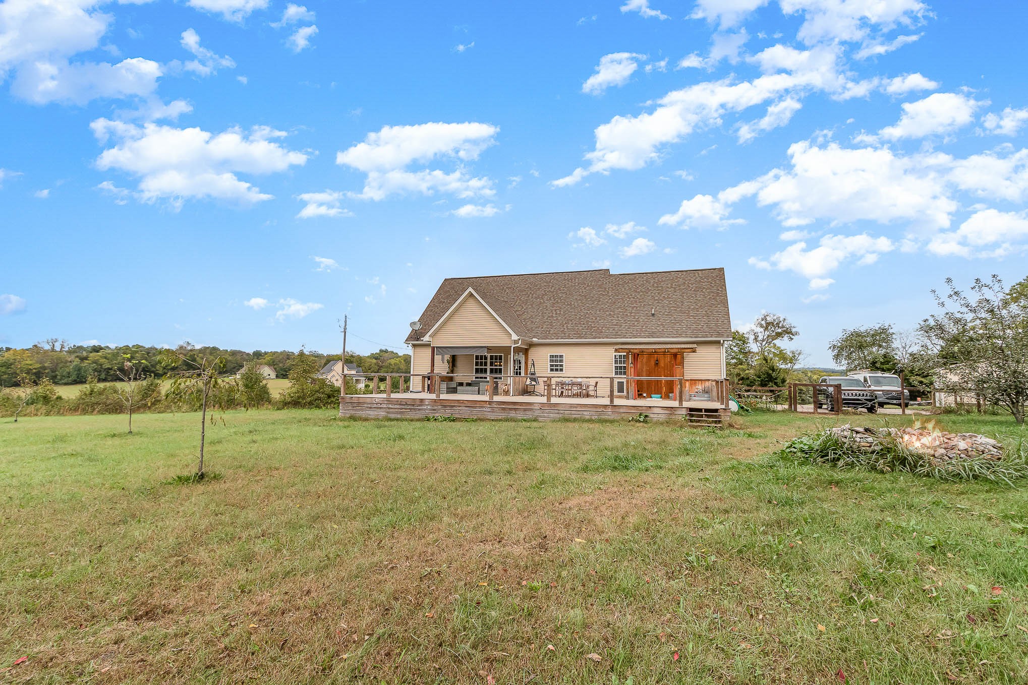 3997 Mitchell Road Lebanon, TN 37087 - Photo 23 of 27 a view of a big house with a big yard and a large tree