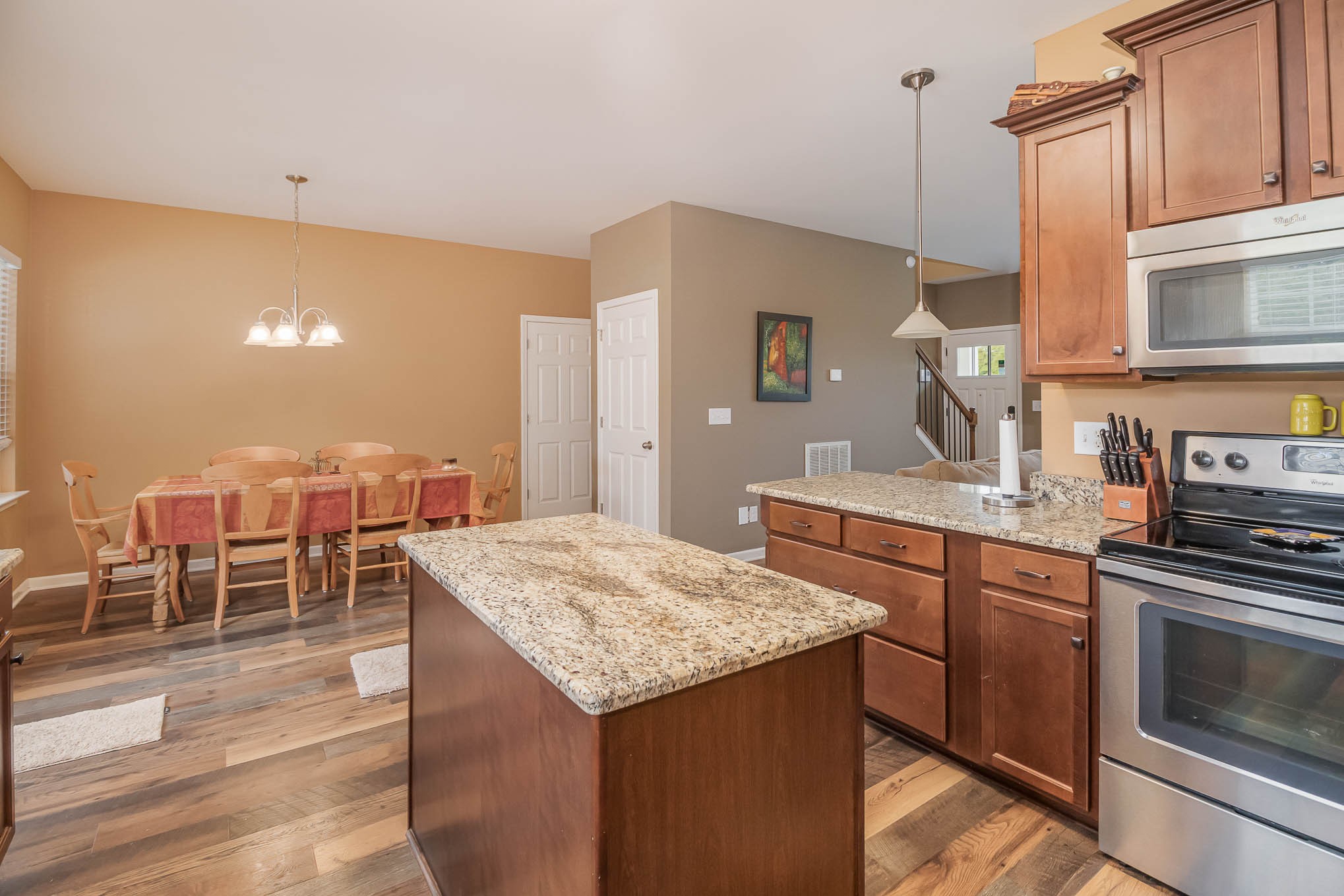 3997 Mitchell Road Lebanon, TN 37087 - Photo 5 of 27 a kitchen with granite countertop sink cabinets and stainless steel appliances