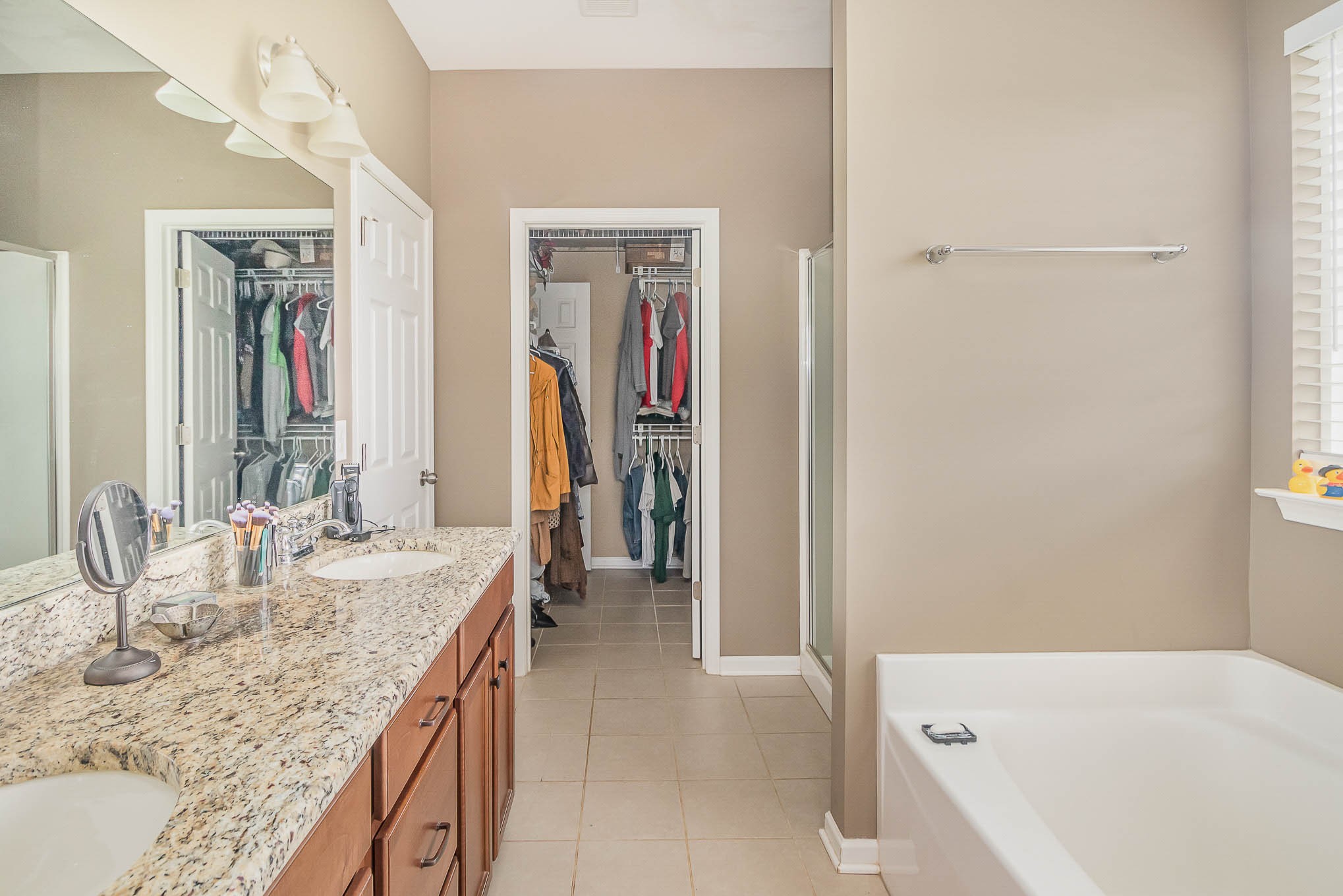 3997 Mitchell Road Lebanon, TN 37087 - Photo 10 of 27 a bathroom with a granite countertop tub and a sink