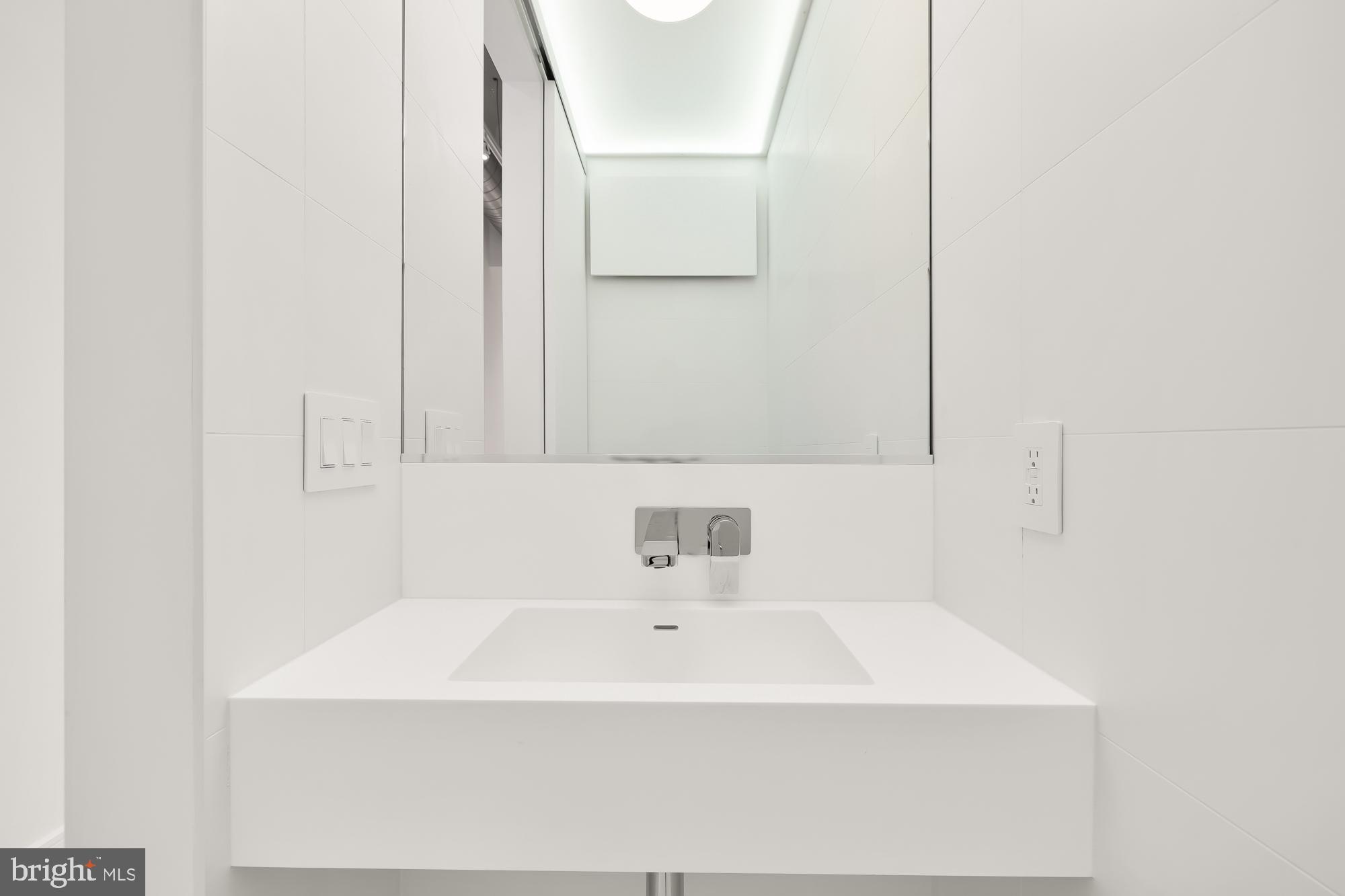 1515 14th Street Northwest, Unit 302 Washington, DC 20005 - Photo 12 of 28 a bathroom with a bathtub