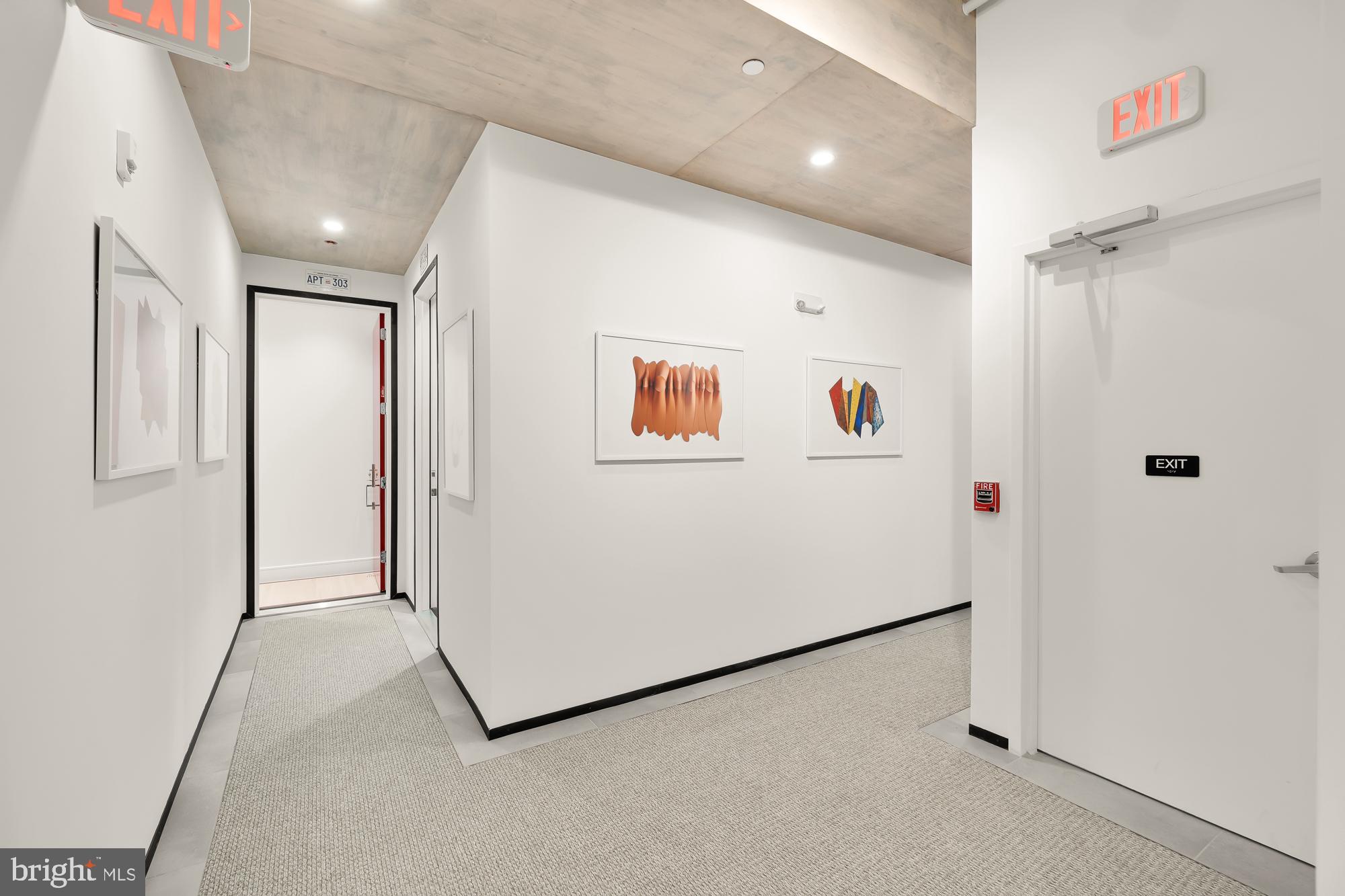 1515 14th Street Northwest, Unit 302 Washington, DC 20005 - Photo 26 of 28 a view of a hallway with closet
