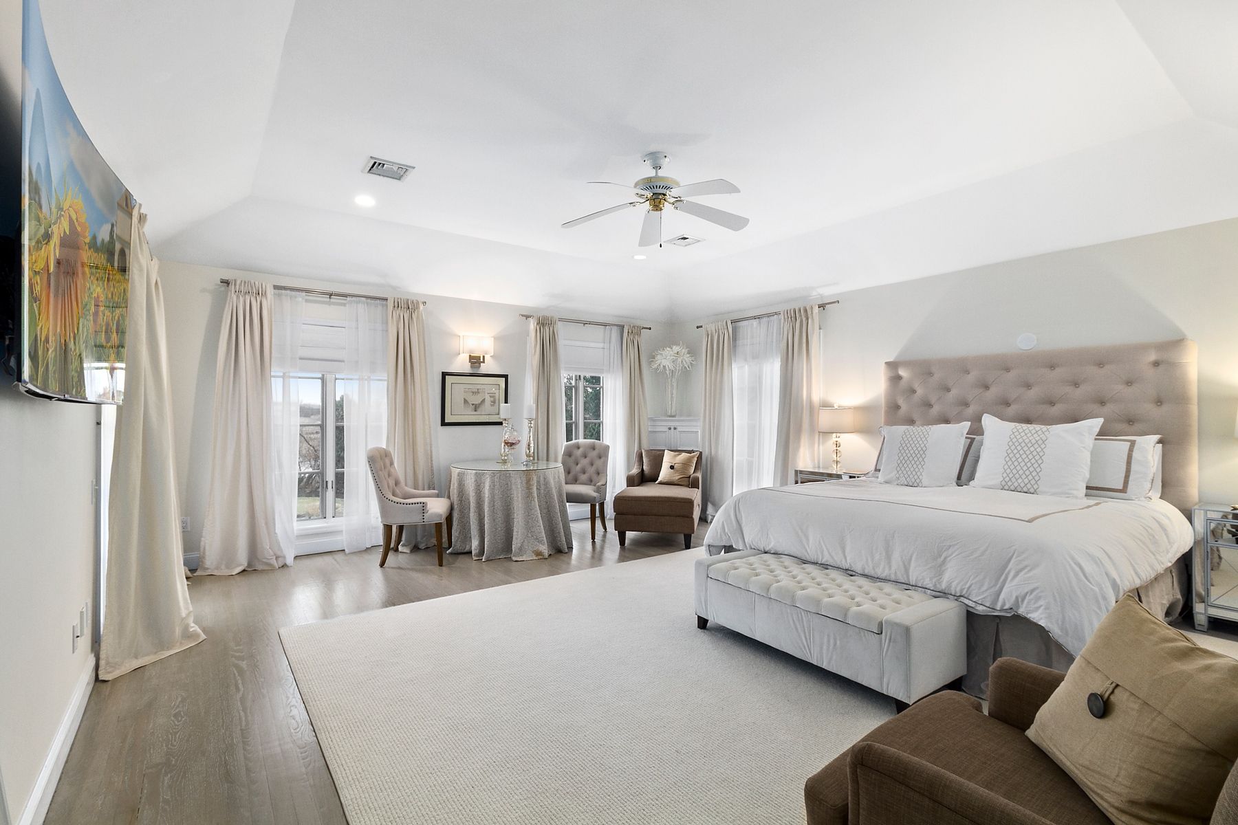 39 Pheasant Close South Southampton, NY 11968 - Photo 18 of 19 a spacious bedroom with a bed couch and window