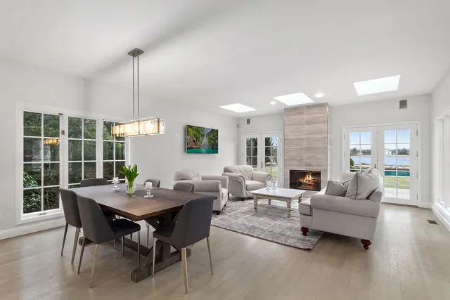 a view of a dining room with furniture window and outside view