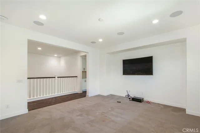 a view of a livingroom with a flat screen tv