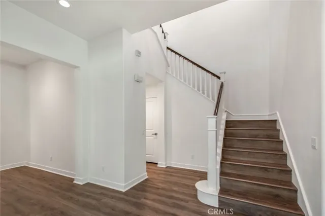 a view of entryway with wooden floor