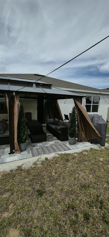570 Feltrim Manor Road Haines City, FL 33844 - Photo 13 of 18 a view of garage with furniture