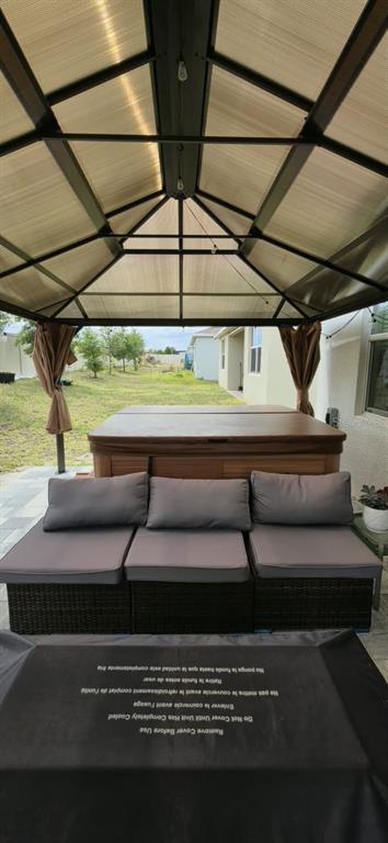 570 Feltrim Manor Road Haines City, FL 33844 - Photo 14 of 18 a view of a roof deck with couch