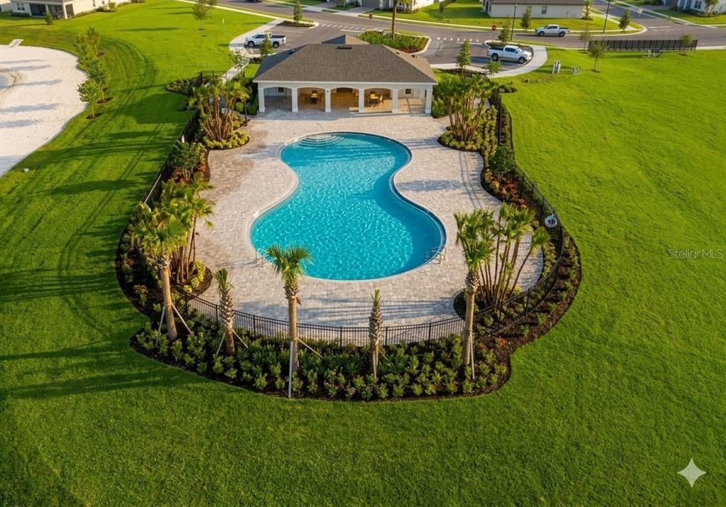 570 Feltrim Manor Road Haines City, FL 33844 - Photo 18 of 18 an aerial view of a house with a garden