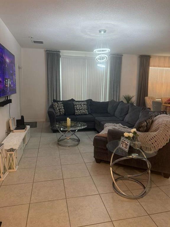 570 Feltrim Manor Road Haines City, FL 33844 - Photo 6 of 18 a living room with furniture