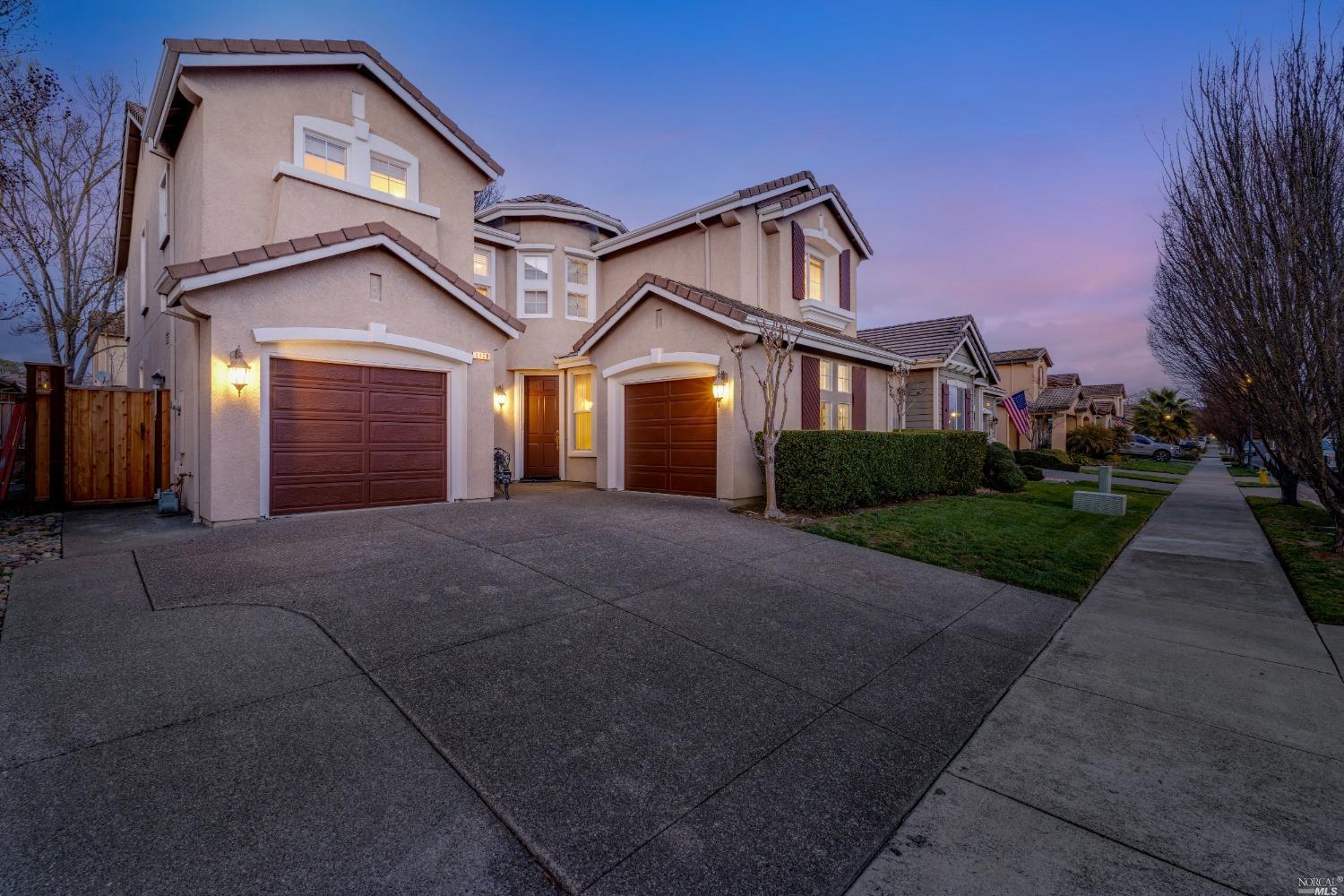 1409 Birdie Drive Windsor, CA 95492 - Photo 1 of 1 a front view of a house with a yard and garage