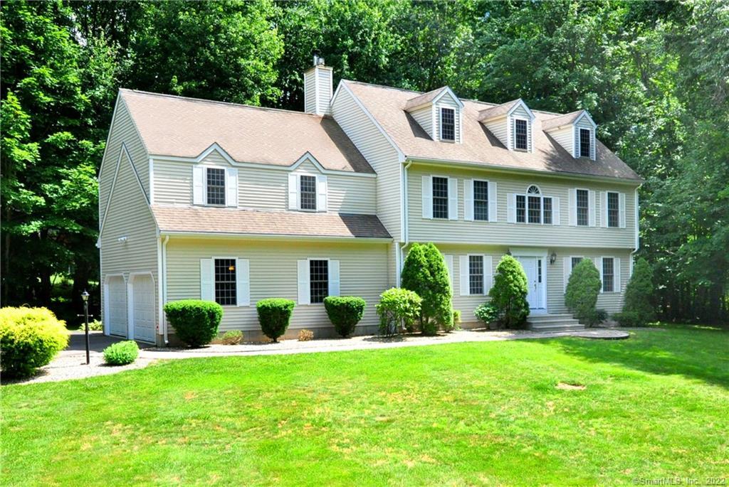 874 Neipsic Road Glastonbury, CT 06033 - Photo 1 of 1 a view of a white house with a big yard and potted plants