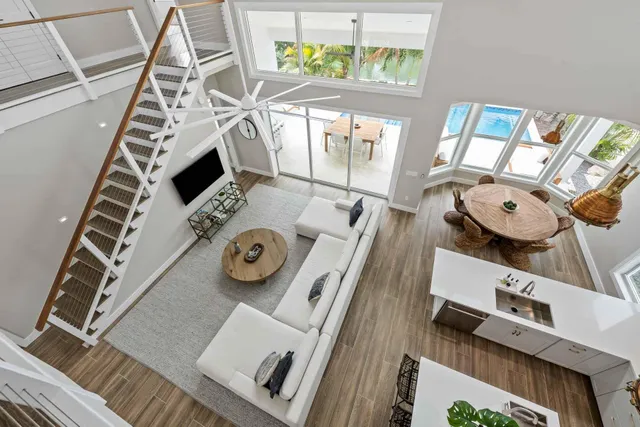 walk in closet with furniture and a mirror