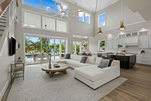a living room with fireplace furniture and a flat screen tv