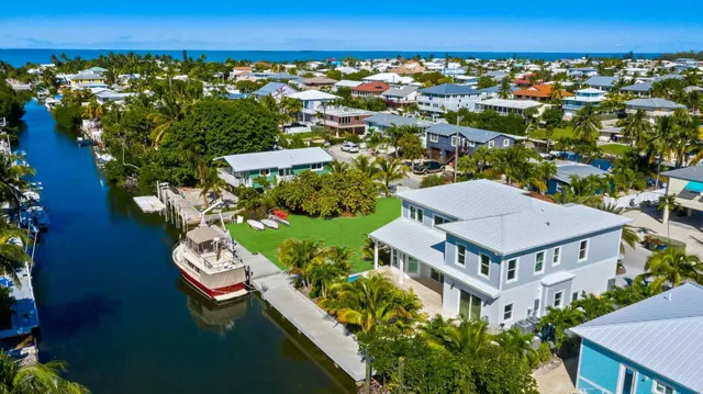 an aerial view of a house with a garden
