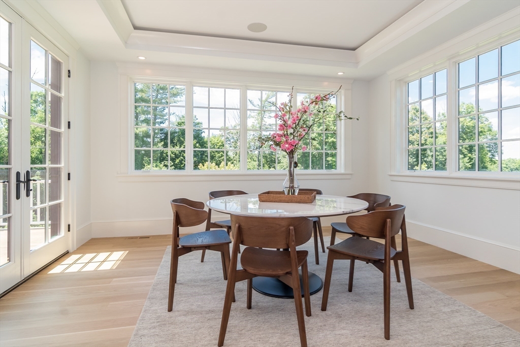 96 Love Lane Weston, MA 02493 - Photo 15 of 37 a view of a dining room with furniture window and outside view