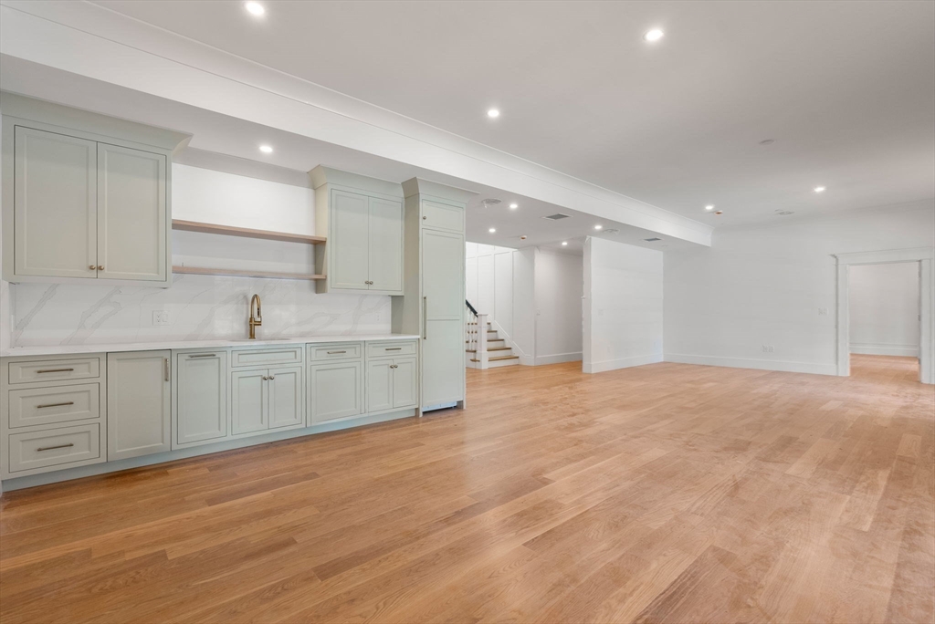 96 Love Lane Weston, MA 02493 - Photo 24 of 37 a view of a kitchen with white cabinets