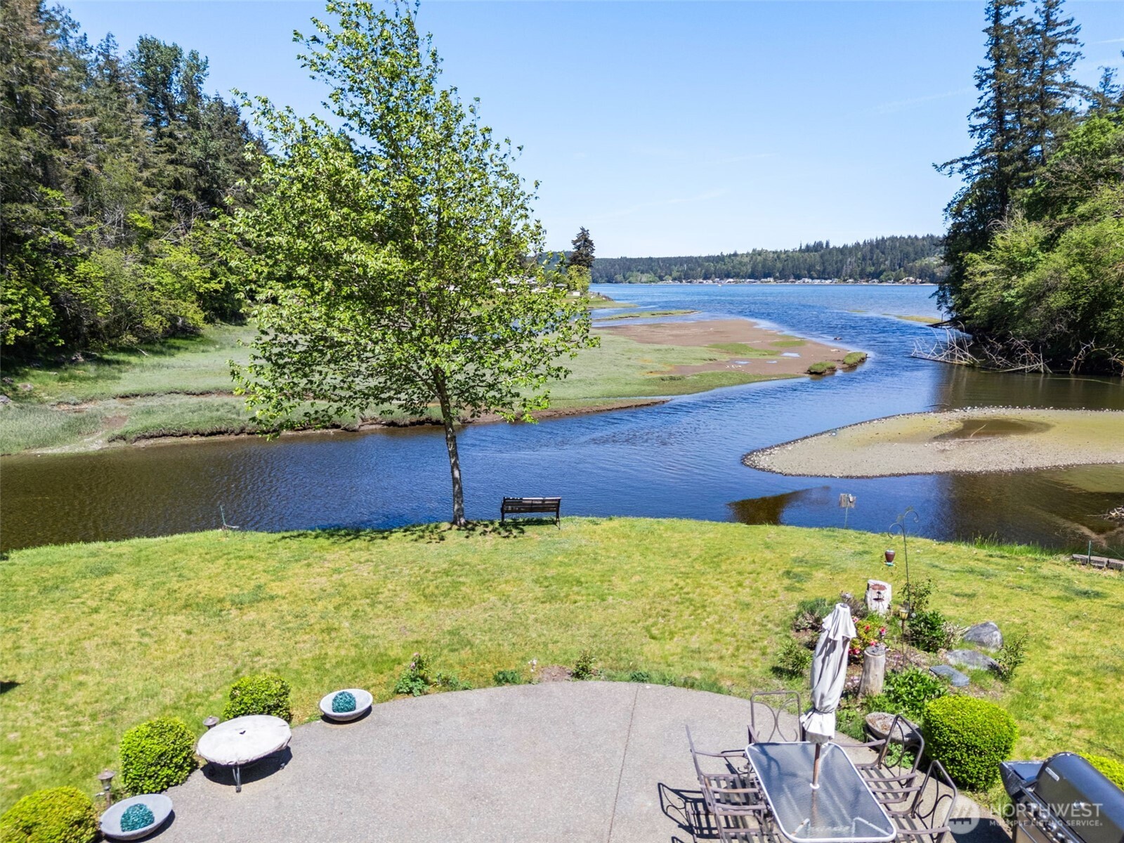 8320 East Grapeview Loop Road Allyn, WA 98524 - Photo 30 of 38 a view of an outdoor space and a yard