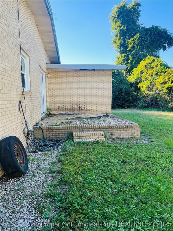 1505 7th Street Lumberton, NC 28358 - Photo 5 of 24 a backyard of a house with lots of green space