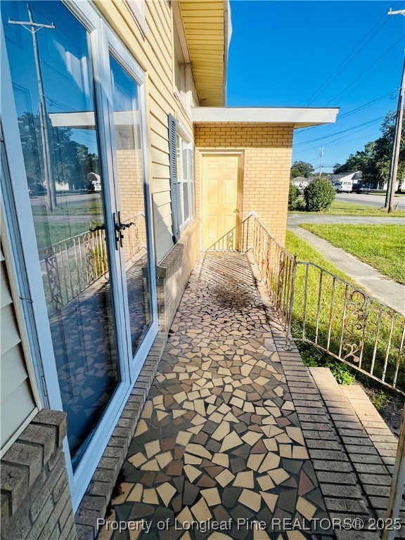 1505 7th Street Lumberton, NC 28358 - Photo 7 of 24 a view of a pathway with a balcony