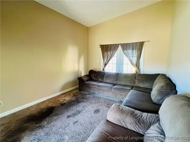 a living room with a couch and a table
