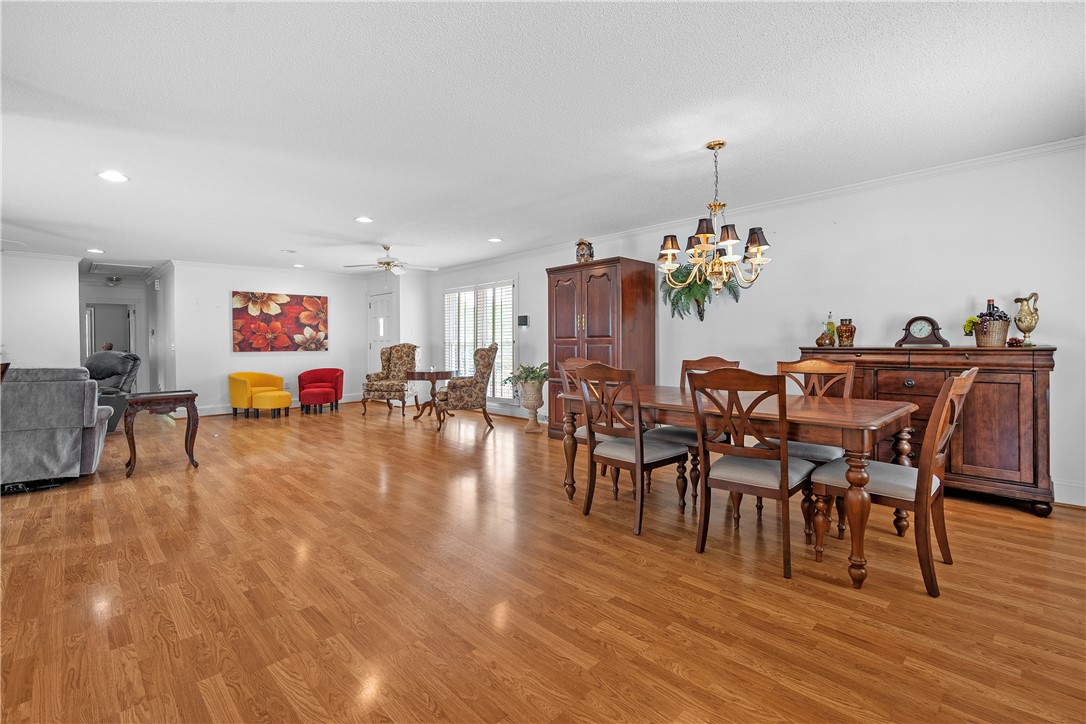 103 Pine Needle Trail Anderson, SC 29625 - Photo 11 of 41 This expansive interior features light wood flooring and bright recessed lighting.