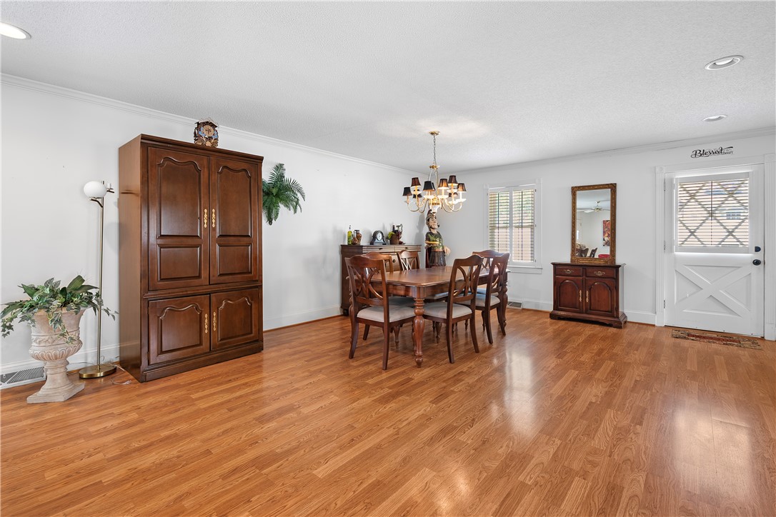 103 Pine Needle Trail Anderson, SC 29625 - Photo 12 of 41 This versatile space provides a harmonious blend of dining and living areas, creating an inviting atmosphere.