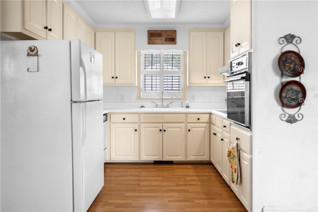 103 Pine Needle Trail Anderson, SC 29625 - Photo 14 of 41 Bright and functional kitchen featuring ample cabinetry and essential appliances for everyday living.