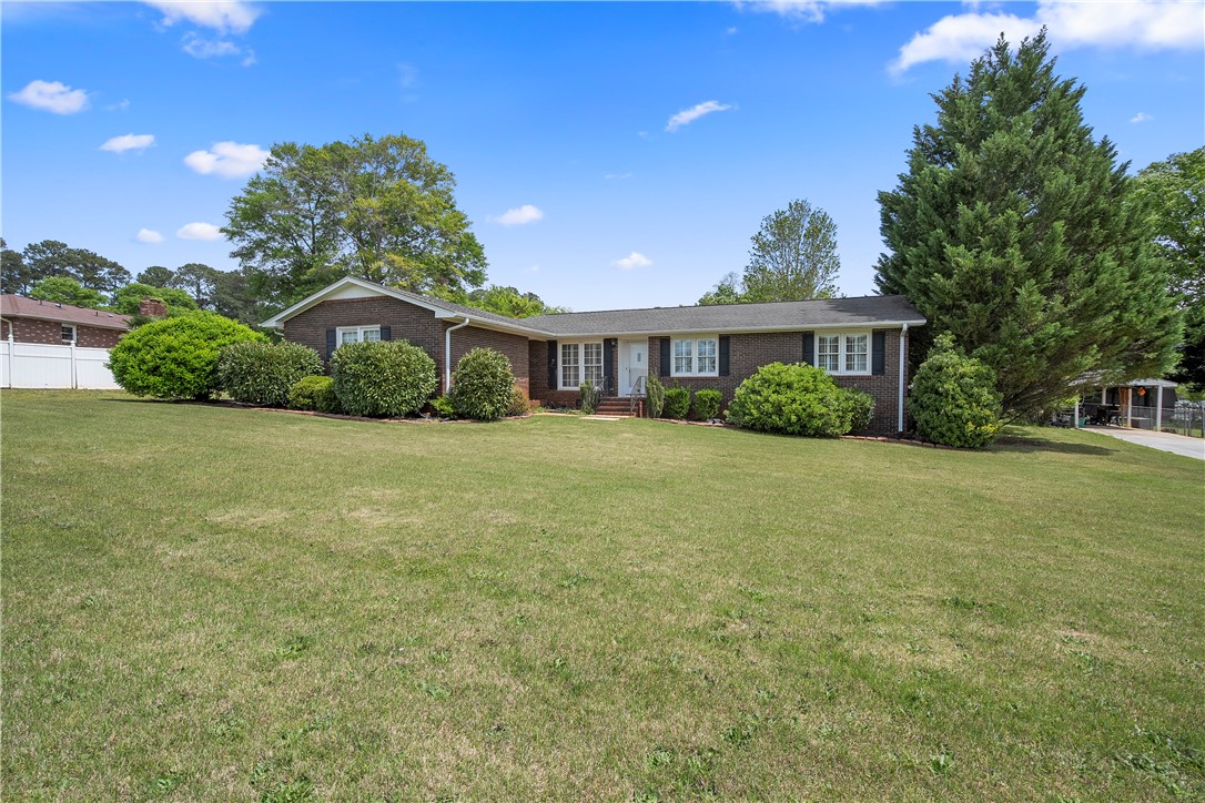 103 Pine Needle Trail Anderson, SC 29625 - Photo 3 of 41 This classic brick residence features a lush, expansive front lawn and inviting curb appeal.