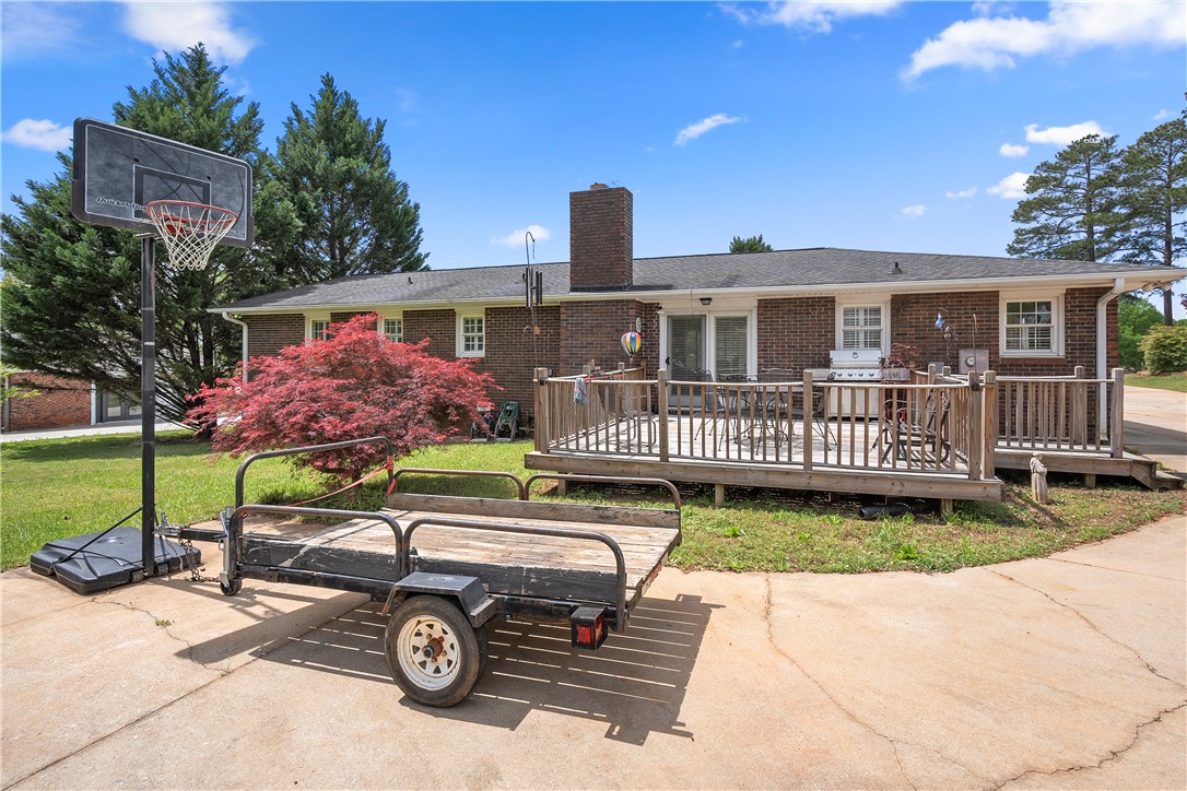103 Pine Needle Trail Anderson, SC 29625 - Photo 34 of 41 This spacious brick home features a deck perfect for outdoor gatherings and relaxation.