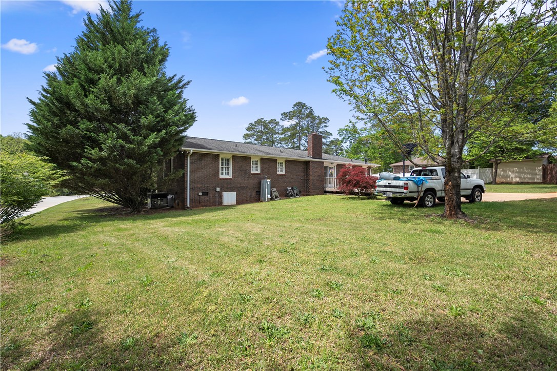 103 Pine Needle Trail Anderson, SC 29625 - Photo 36 of 41 This residence features a spacious yard and classic brick construction.
