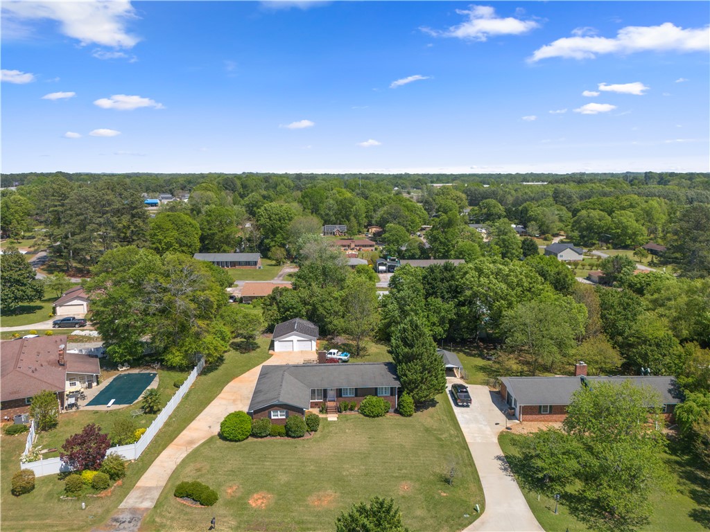 103 Pine Needle Trail Anderson, SC 29625 - Photo 39 of 41 This expansive aerial view showcases a charming residence nestled within a vibrant, verdant neighborhood.