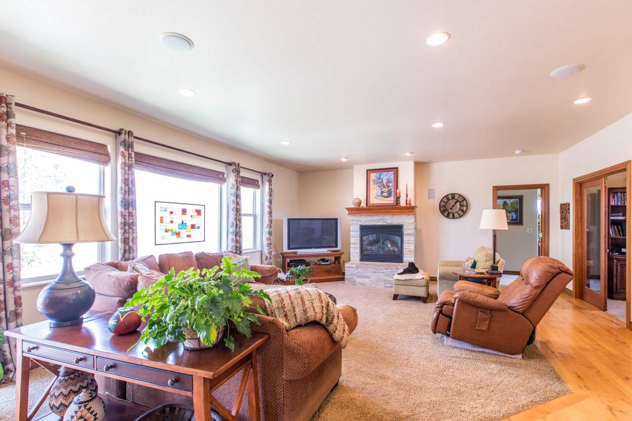 2174 M Road Grand Junction, CO 81505 - Photo 2 of 42 a living room with furniture fireplace and a window