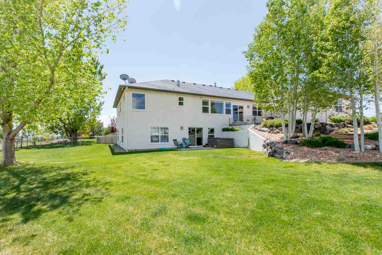 2174 M Road Grand Junction, CO 81505 - Photo 36 of 42 a view of a house with backyard and garden