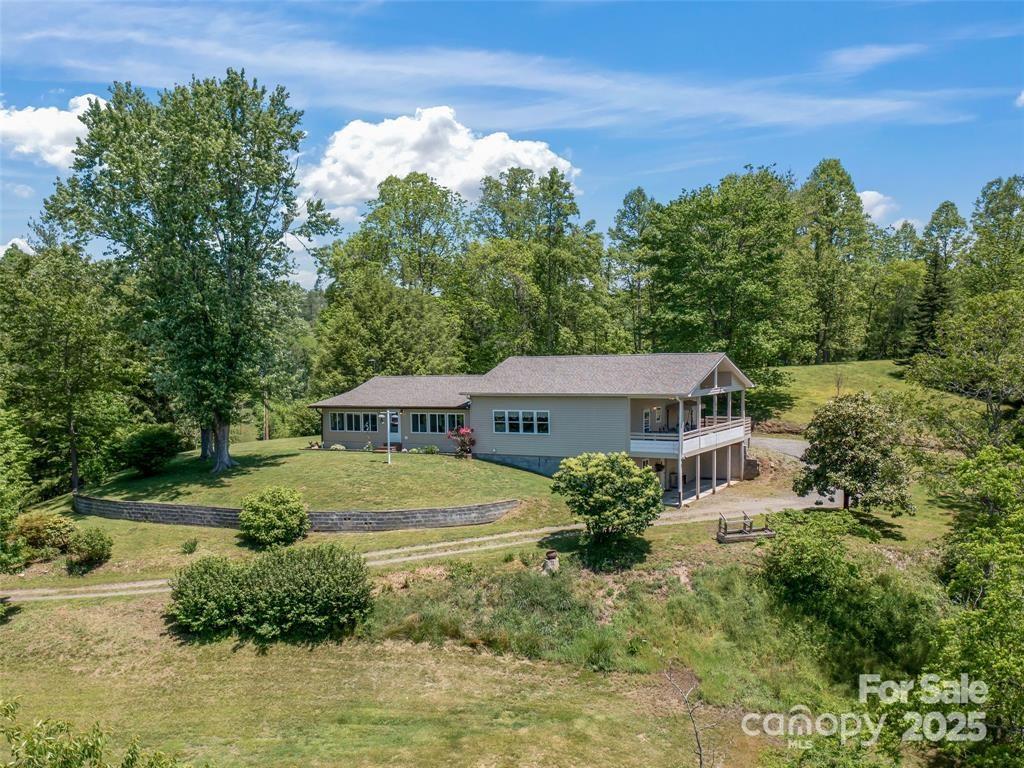 90 Coates Road Marshall, NC 28753 - Photo 1 of 48 a front view of a house with a yard