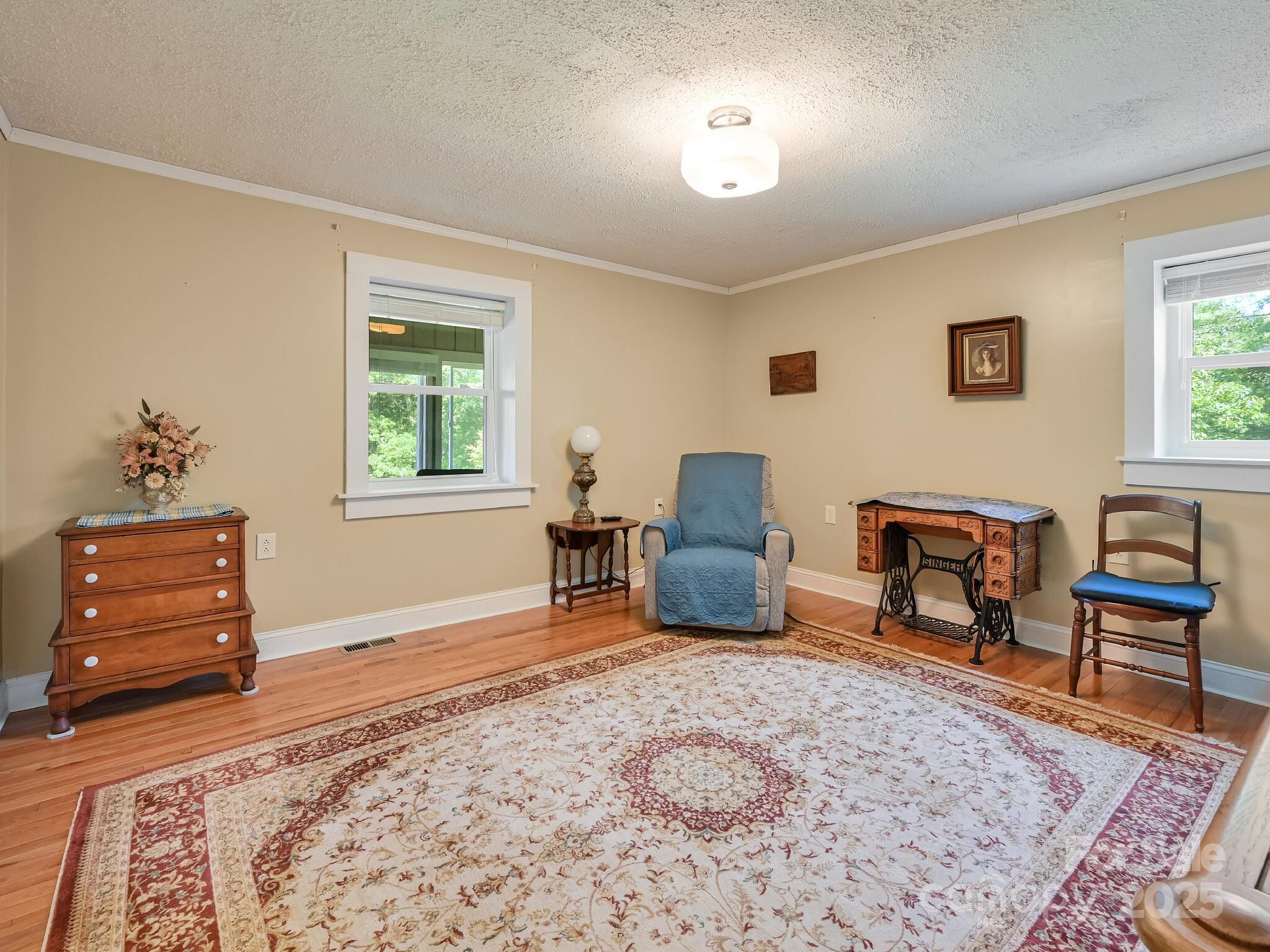 90 Coates Road Marshall, NC 28753 - Photo 11 of 48 a living room with furniture and a window