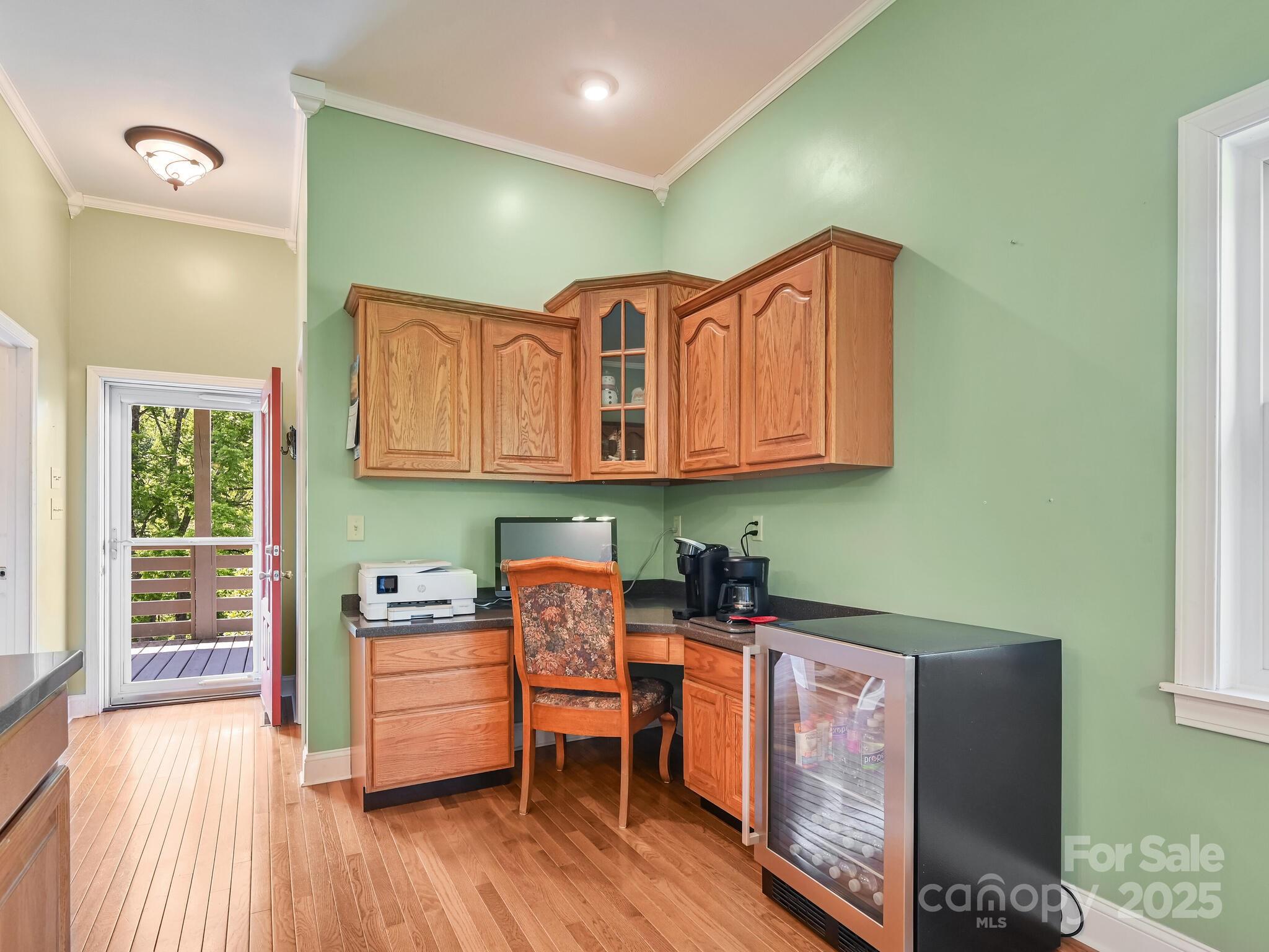 90 Coates Road Marshall, NC 28753 - Photo 19 of 48 a kitchen with stainless steel appliances granite countertop a sink and wooden cabinets