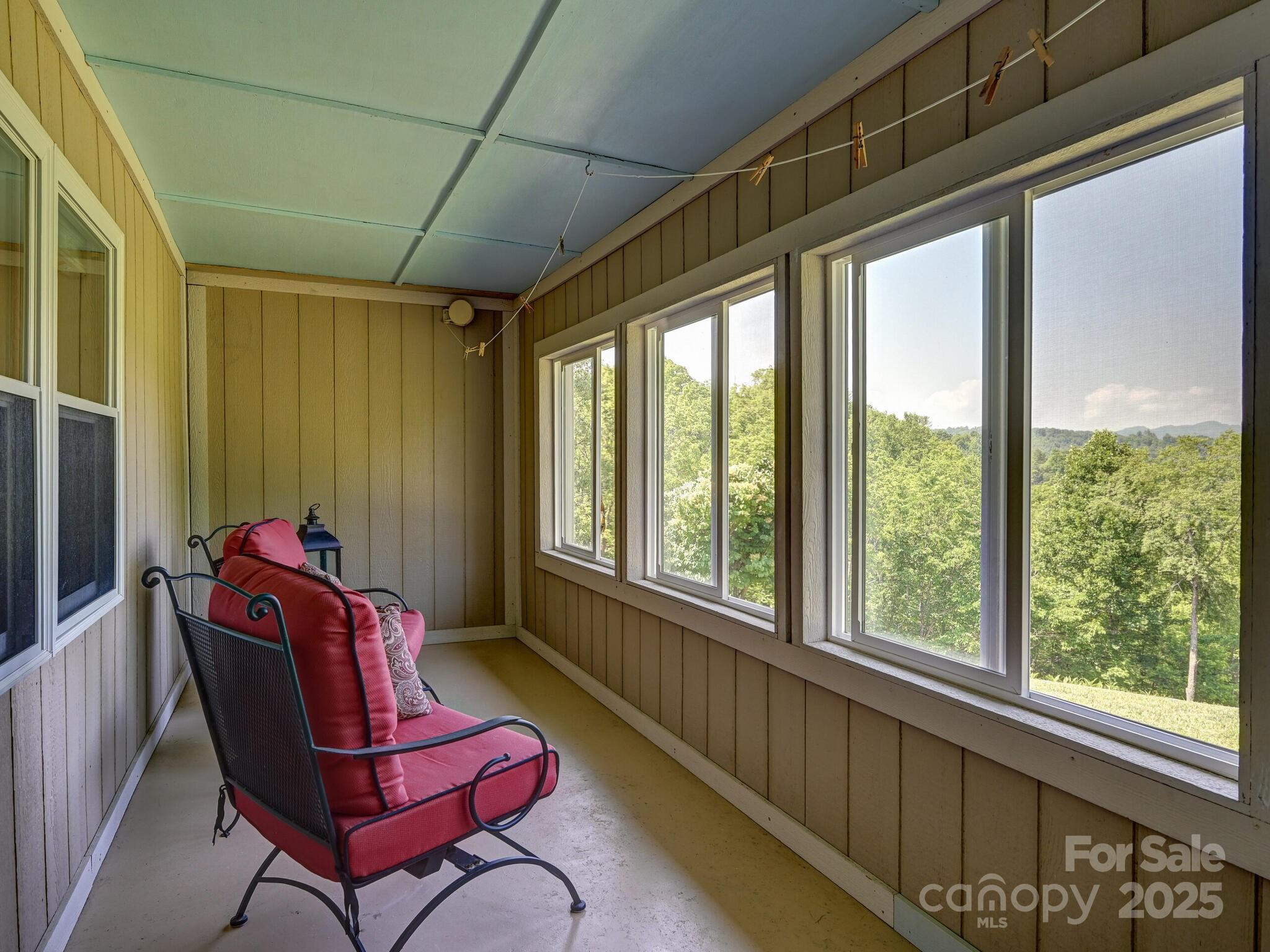 90 Coates Road Marshall, NC 28753 - Photo 6 of 48 a living room with furniture and a window
