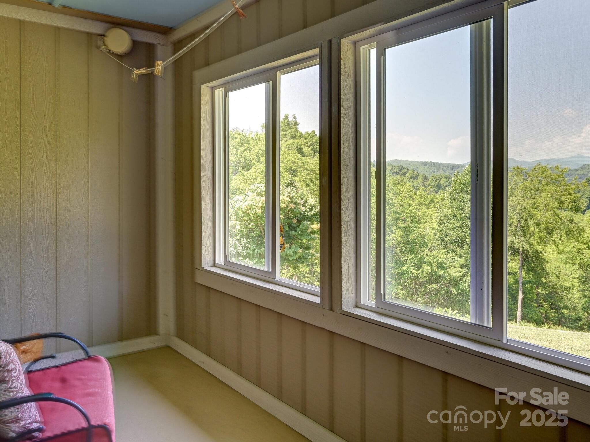 90 Coates Road Marshall, NC 28753 - Photo 7 of 48 a view of an empty room with a window