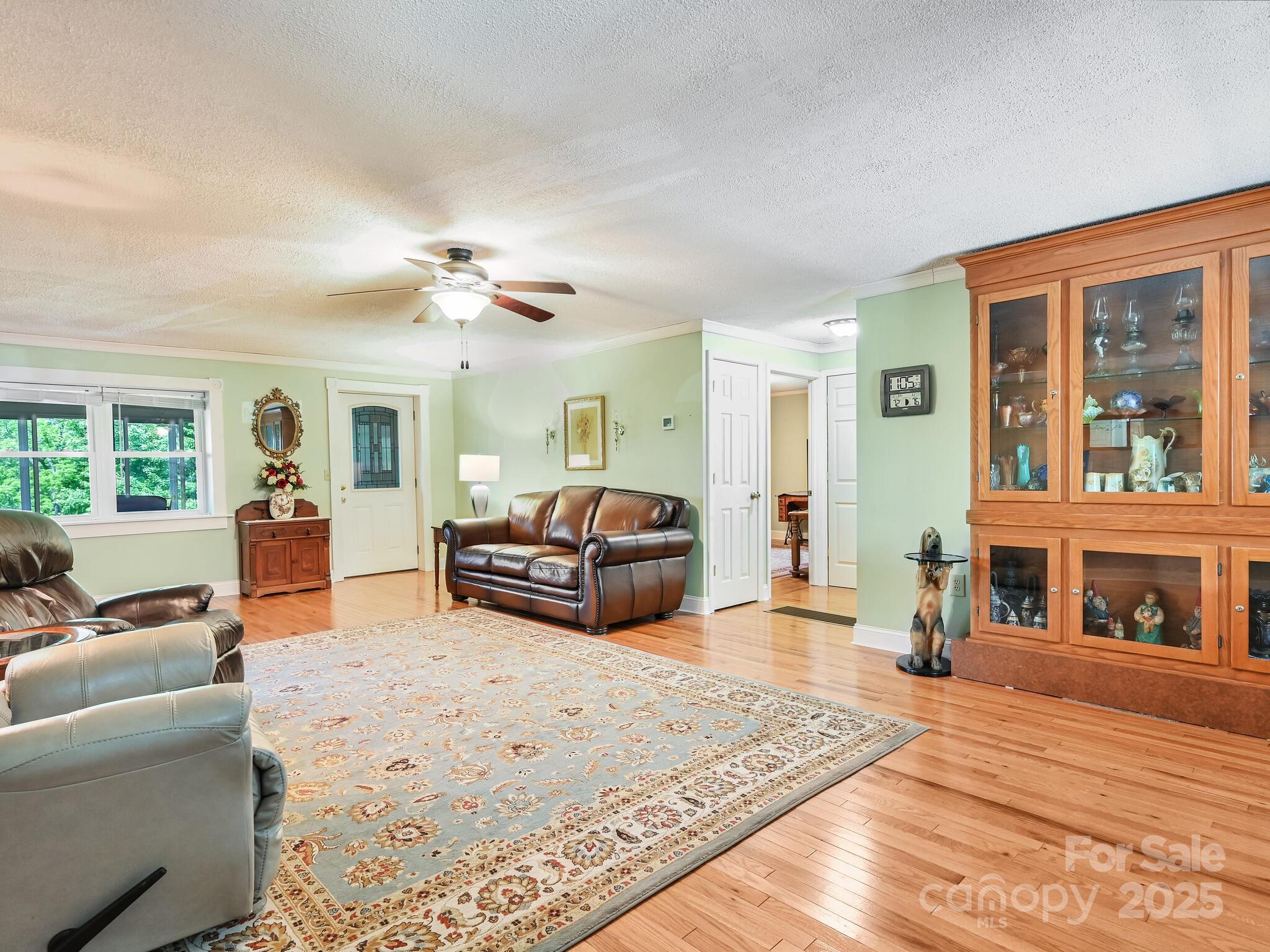 90 Coates Road Marshall, NC 28753 - Photo 8 of 48 a living room with furniture and a fireplace