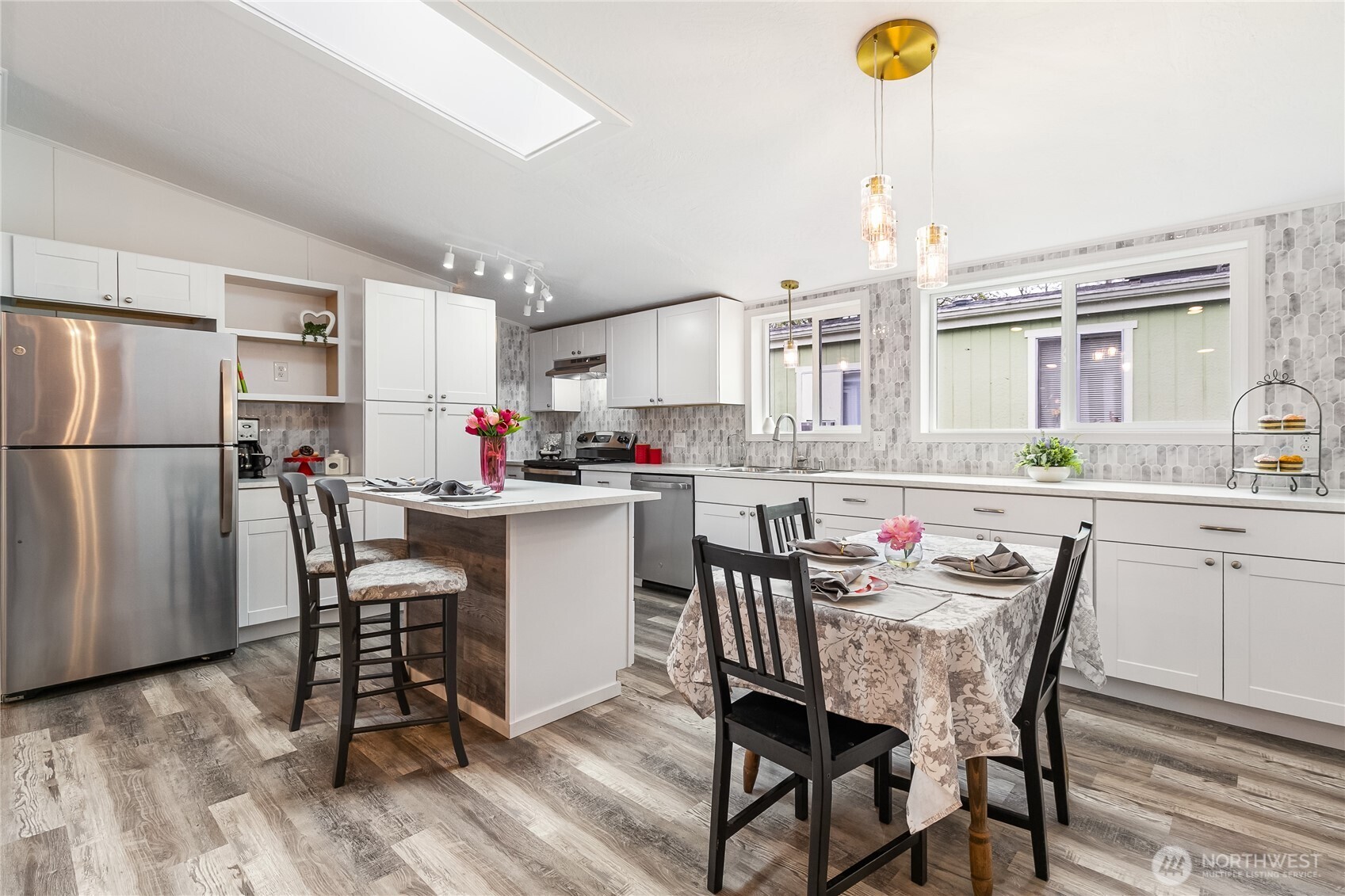 2350 Douglas Road, Unit 39 Ferndale, WA 98248 - Photo 11 of 35 a table and chairs in a kitchen