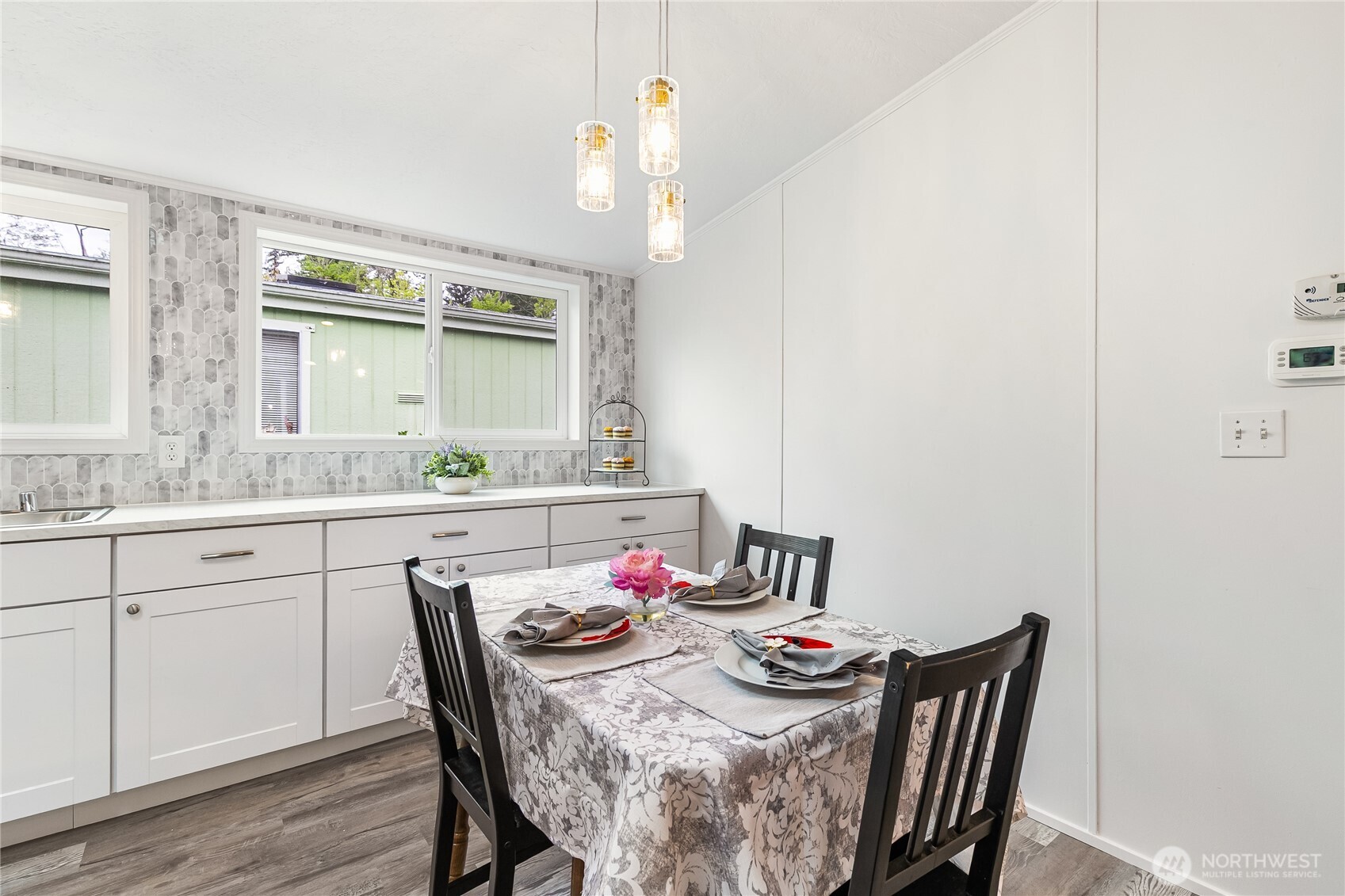 2350 Douglas Road, Unit 39 Ferndale, WA 98248 - Photo 12 of 35 a view of a dining room that has a table and chairs in it